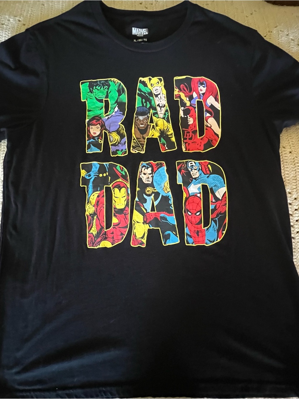 Marvel "Rad Dad" graphic tee with superheroes inside the letters
